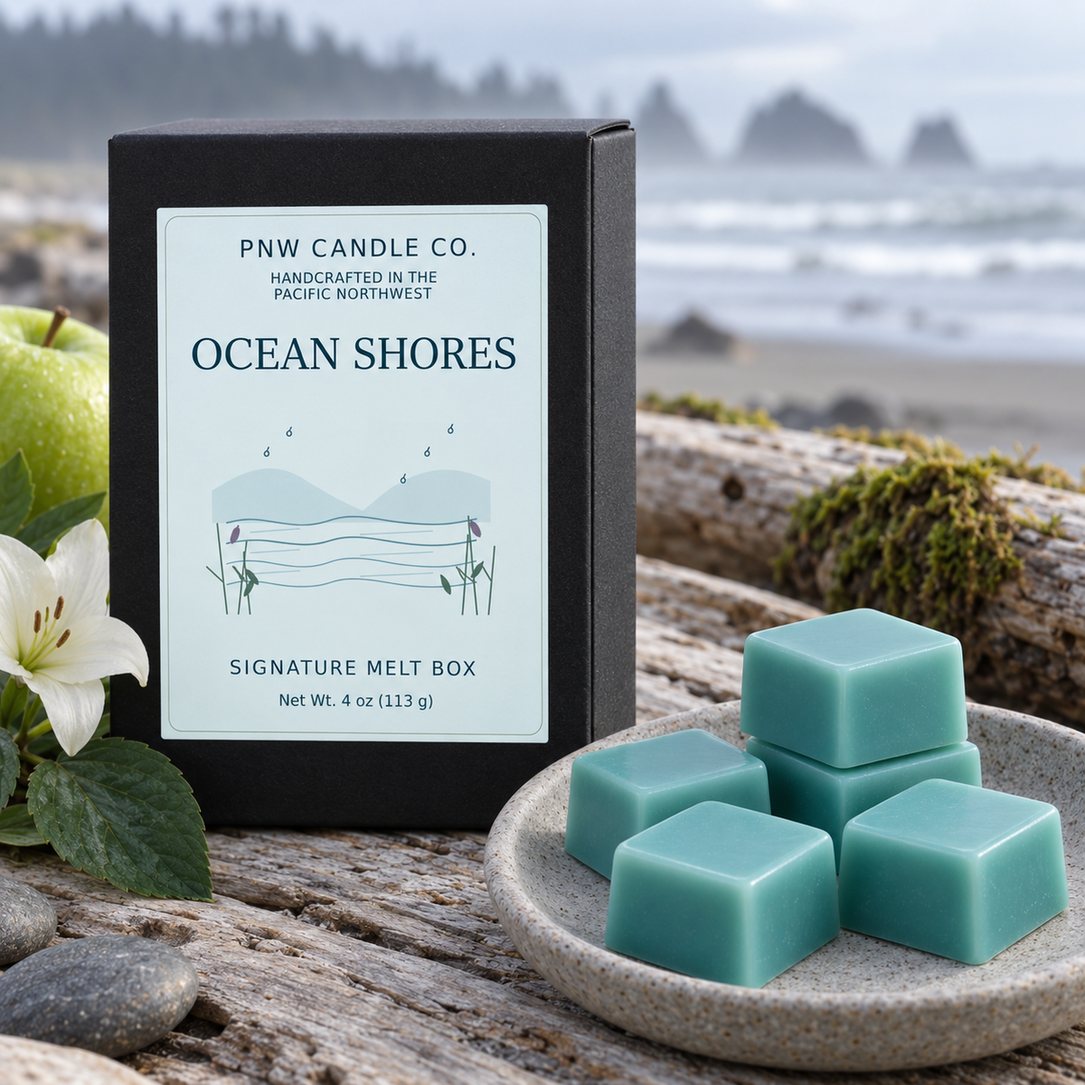Ocean Shores wax melts in a coastal scene with green apple, lily and fresh-rain elements.