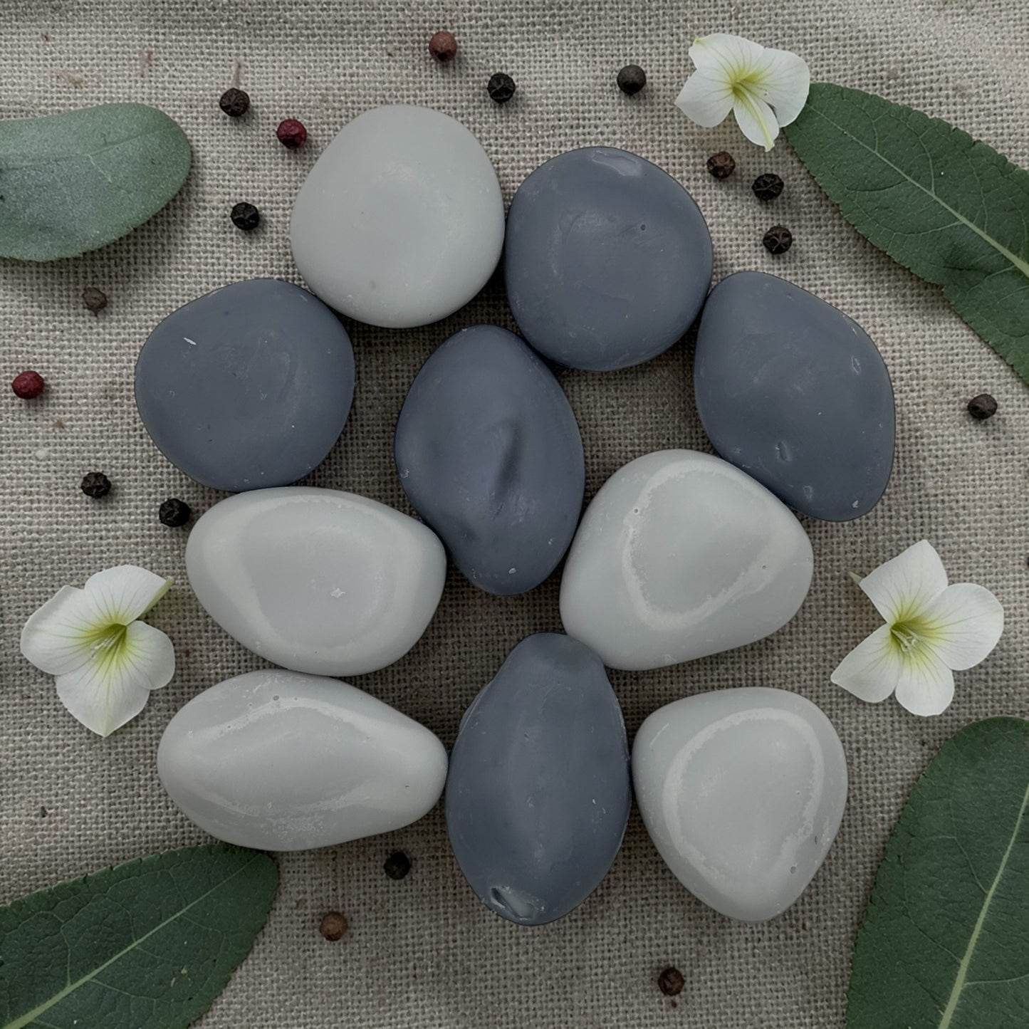 Sea & Stone wax tart from PNW Candle Co, showing a fragrant wax melt with ocean-inspired scent and natural appearance.
