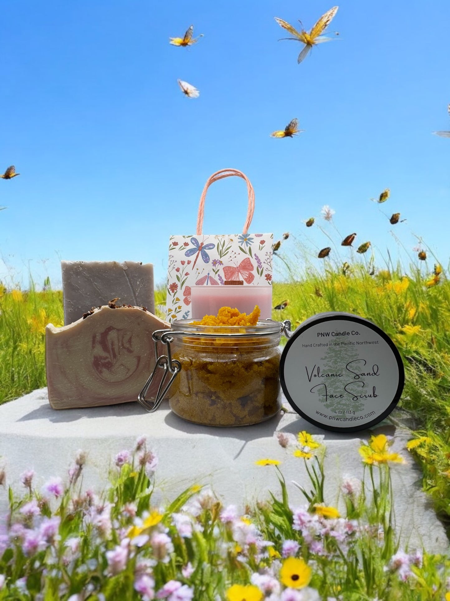 PNW Candle Co Ultimate Pampering Collection gift set with candles and self-care essentials arranged in a decorative box.