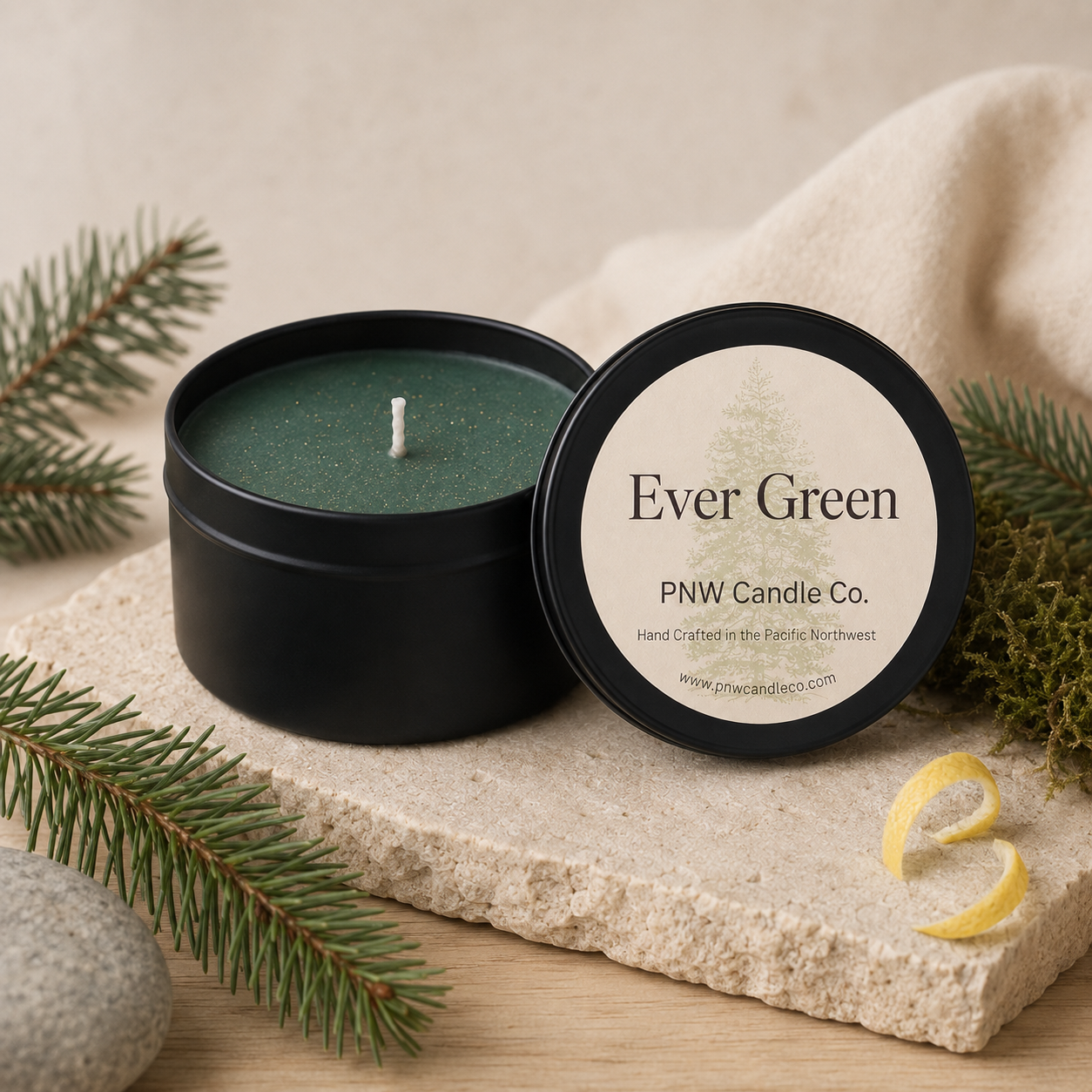 Ever Green scented candle by PNW Candle Co. with deep green wax, Fraser fir branches, cedar, moss, and lemon peel.