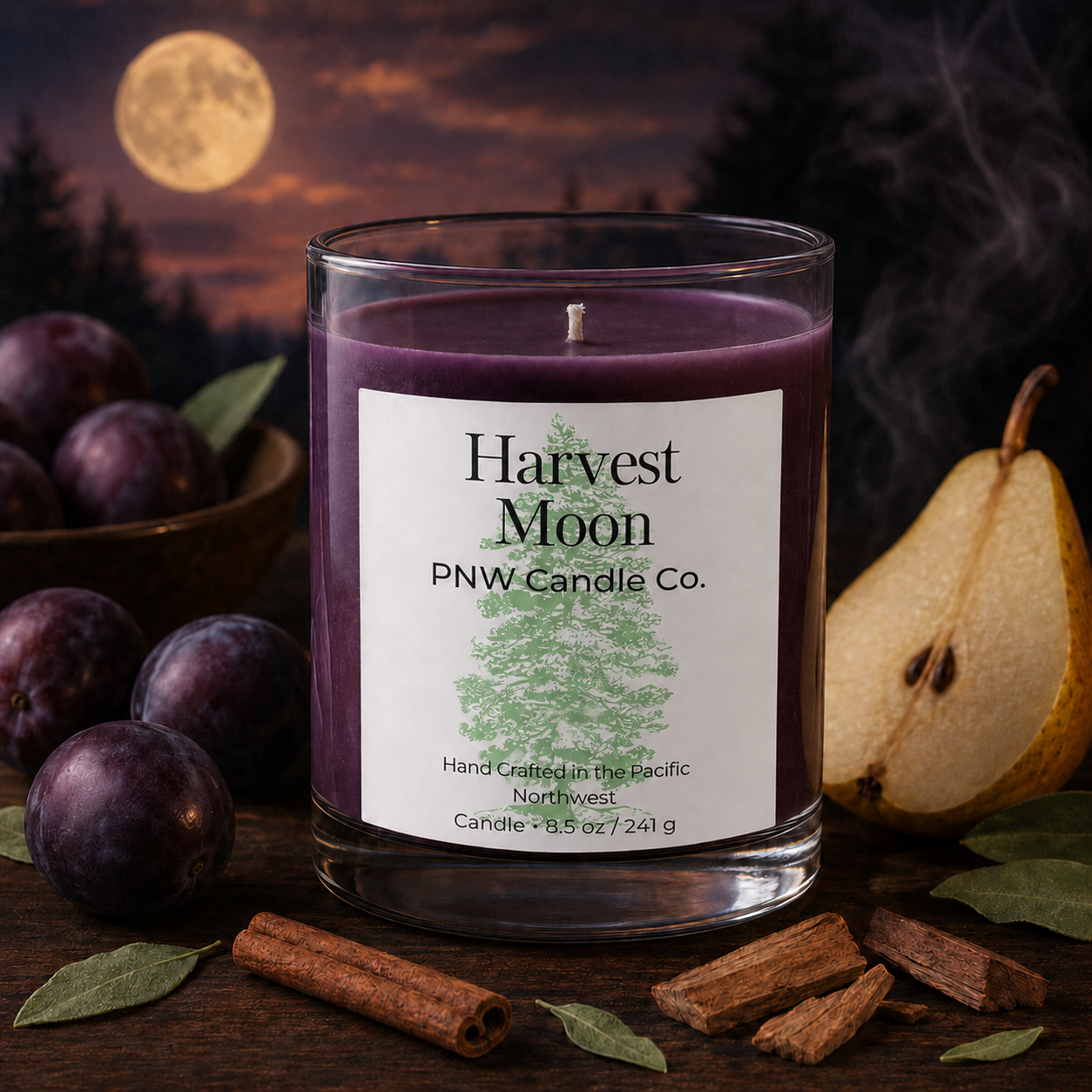 Harvest Moon 8.5 oz purple wax scented candle with PNW Candle Co. evergreen label