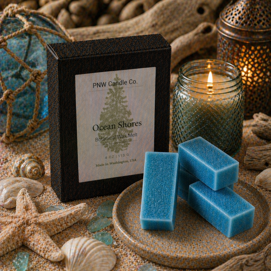 Ocean Shores wax tart by PNW Candle Co, a fragrant wax melt with ocean-inspired scent, displayed in a clear wax tart shape.