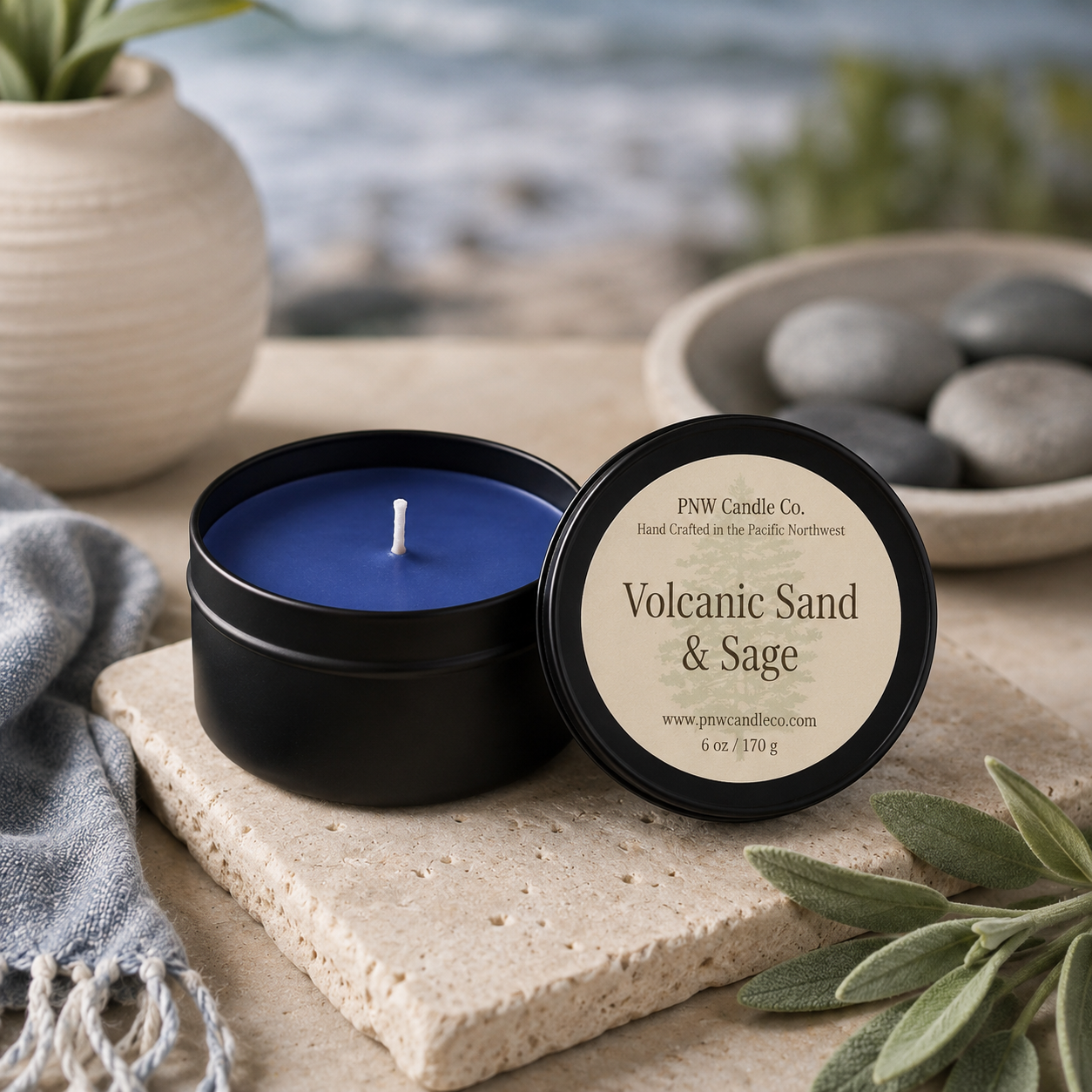 PNW Candle Co volcanic sand and sage scented candle in a glass jar with a natural, earthy appearance.