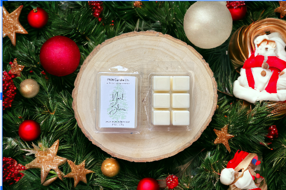 PNW Candle Co Noël Blanc scented wax tart, creamy white wax melt with festive holiday fragrance, shown in a clear container.
