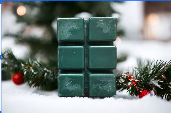 Yule scented wax tart by PNW Candle Co featuring a festive design, ideal for warming with seasonal holiday fragrance.