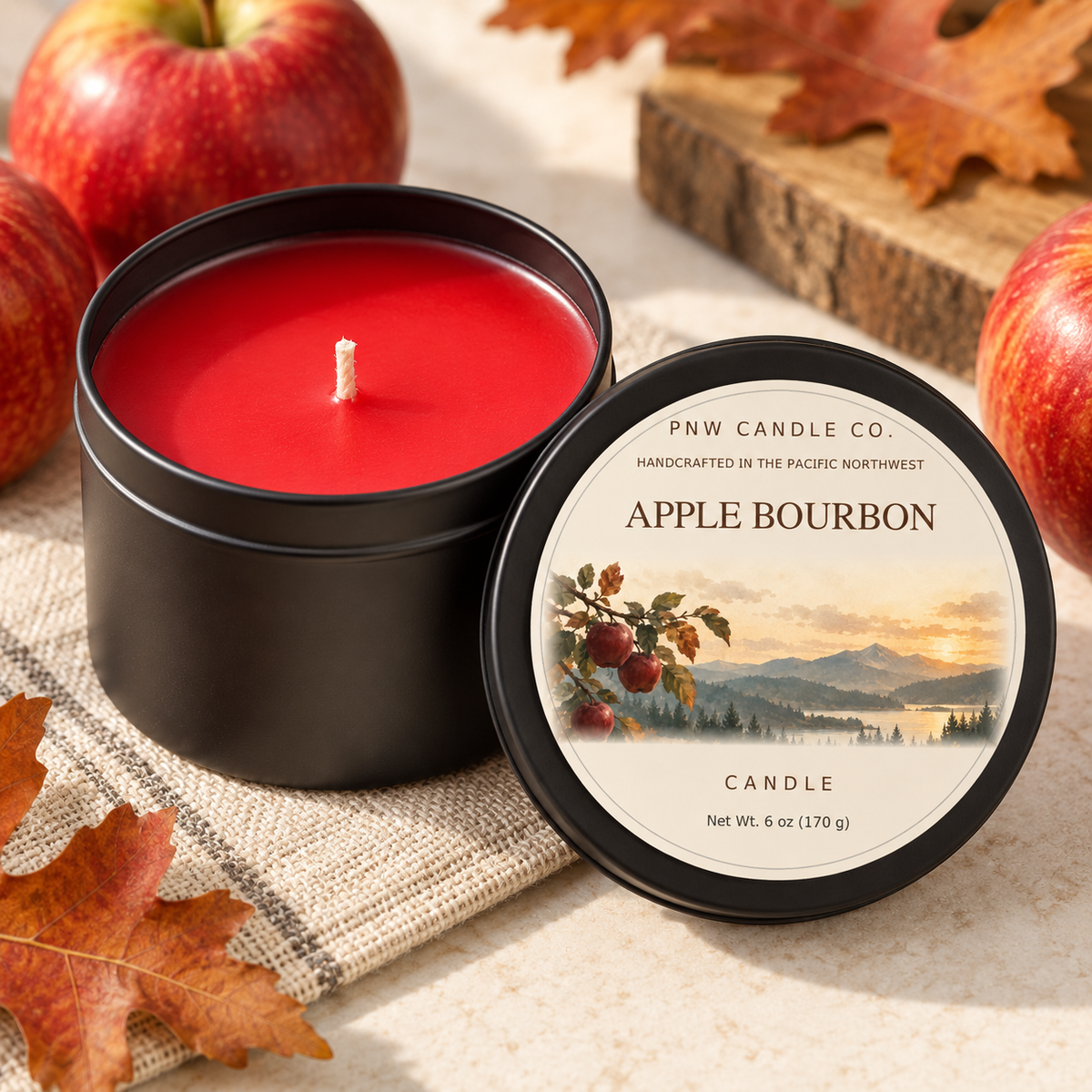 Apple Bourbon 6 oz candle tin with bright red wax and updated PNW Candle Co. label