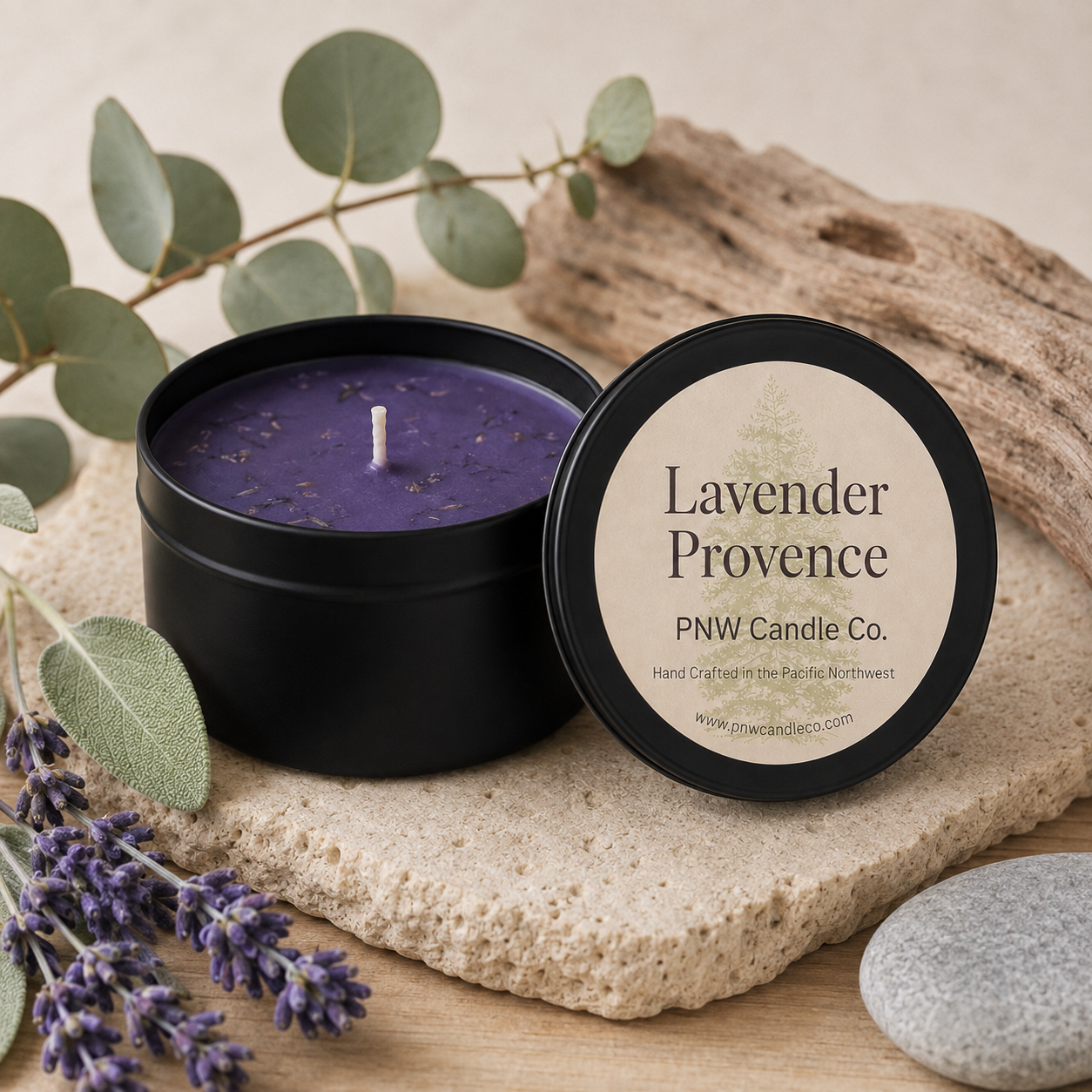 Lavender Provence scented candle by PNW Candle Co. with purple wax, lavender, eucalyptus, sage, driftwood, and coastal stone.