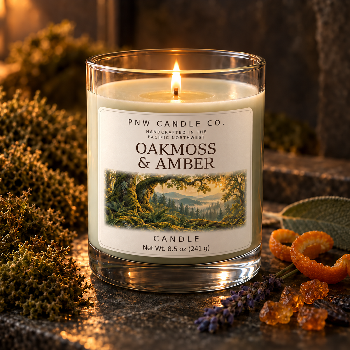 Lit Oakmoss & Amber 8.5 oz candle with forest label