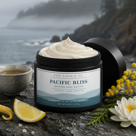 Pacific Bliss 6 oz whipped body butter in a matte-black jar with lemon, white tea, sea salt, and coastal botanicals.
