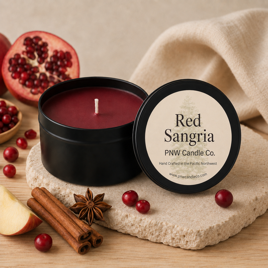 Red Sangria scented candle by PNW Candle Co. with deep burgundy wax, pomegranate, apple cider, and warm spices.