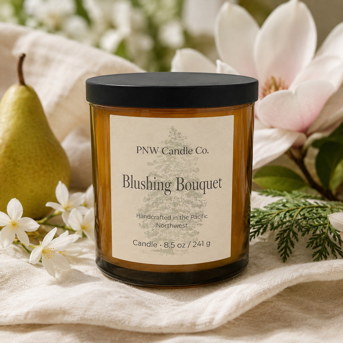 Blushing Bouquet 8.5 oz coconut-apricot wax candle with updated botanical label