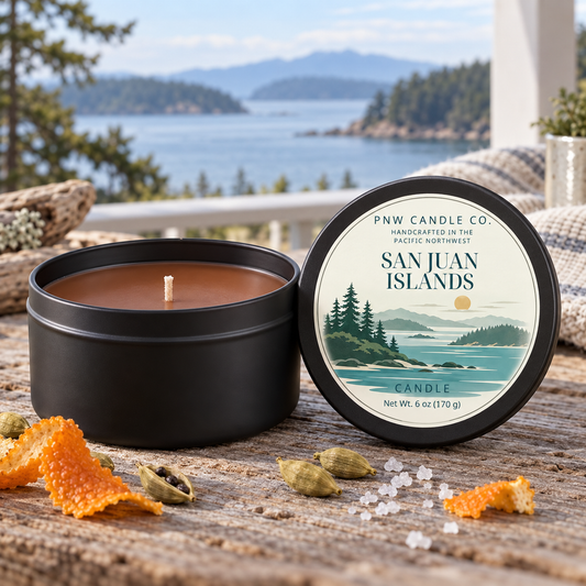 San Juan Islands 6 oz black candle tin with brown wax and illustrated coastal label by PNW Candle Co.
